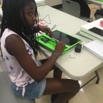 OWL Scholar assembling her computer.
